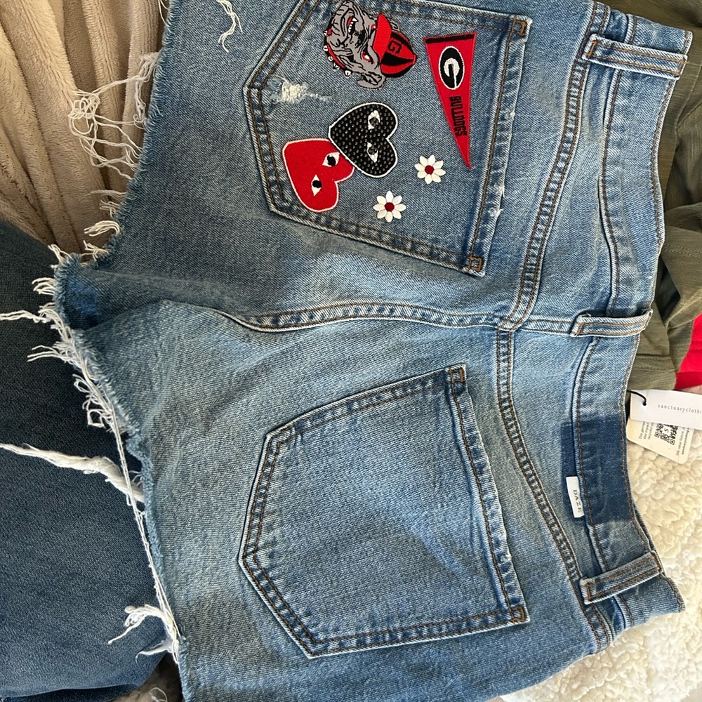 Trendy Blue Denim Women's Shorts with University of Georgia patches
